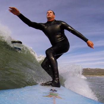 Flat Stanley urges me to go faster, much to the chagrin of another surfer who makes it out of the way in the nick of time