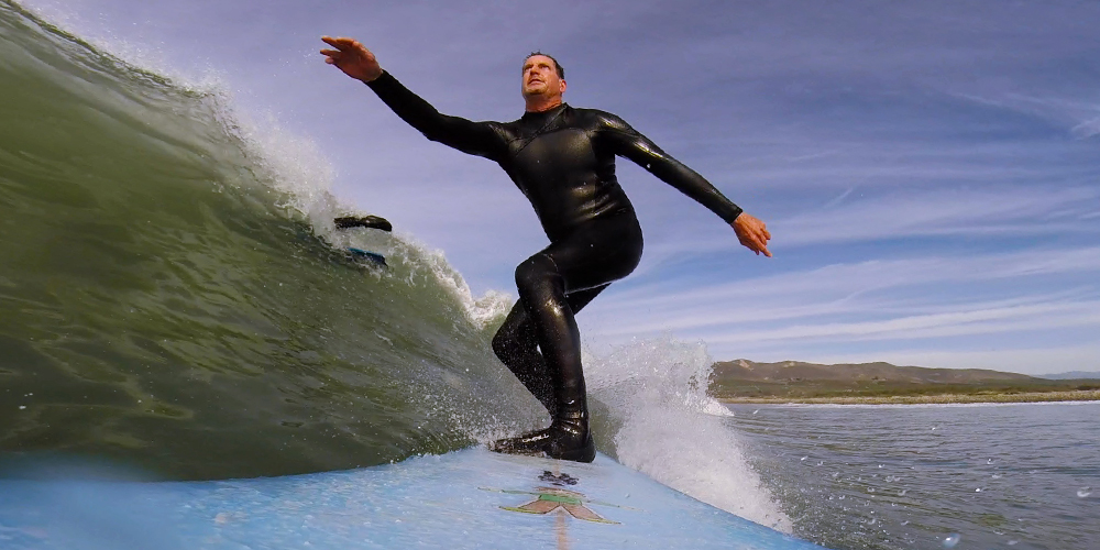 Flat Stanley urges me to go faster, much to the chagrin of another surfer who makes it out of the way in the nick of time