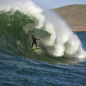 Surfer free falling into large wave (image supplied by sponsor)